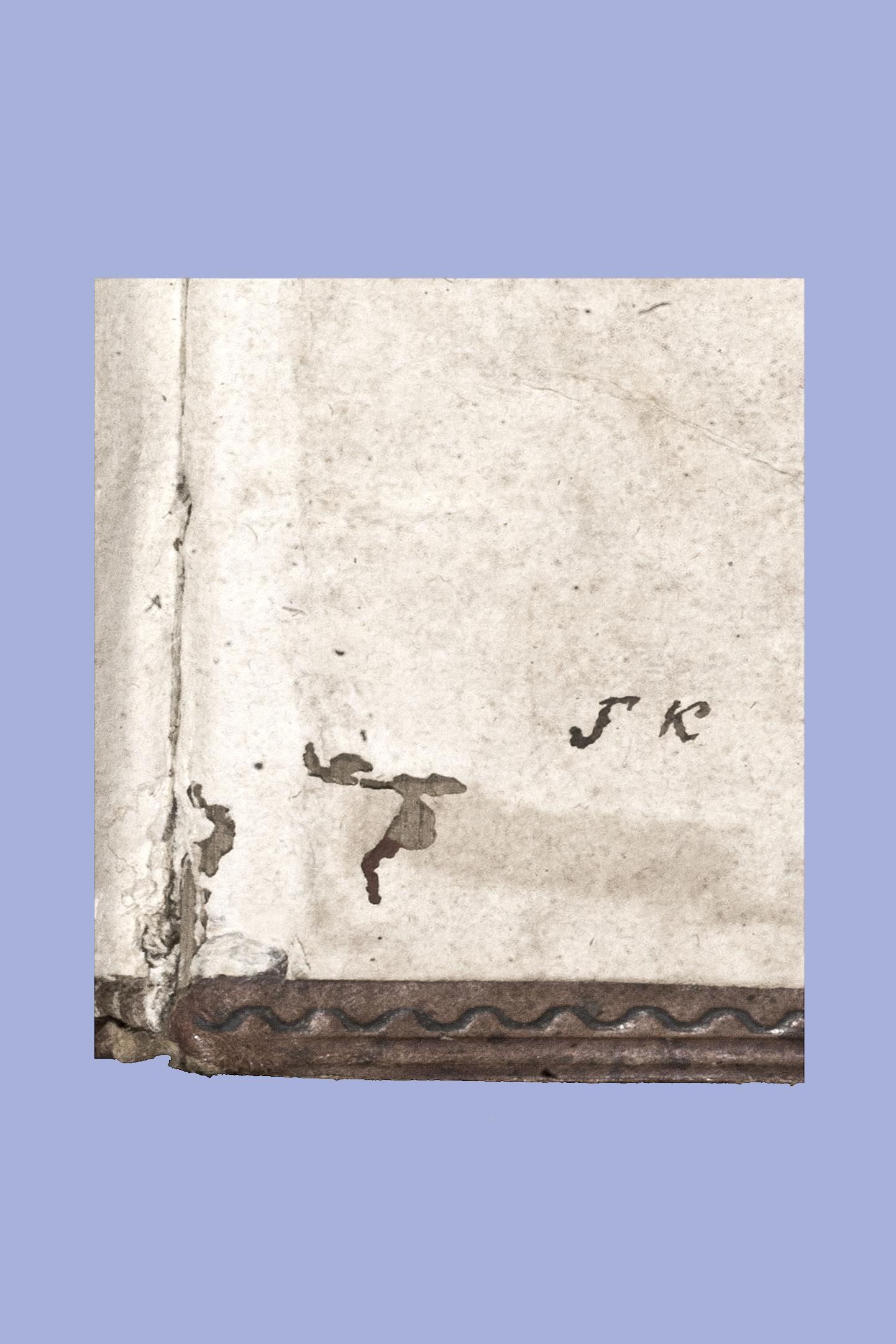 21.XVI. Фрагмент обклейки нижней крышки с инициалами переплетчика